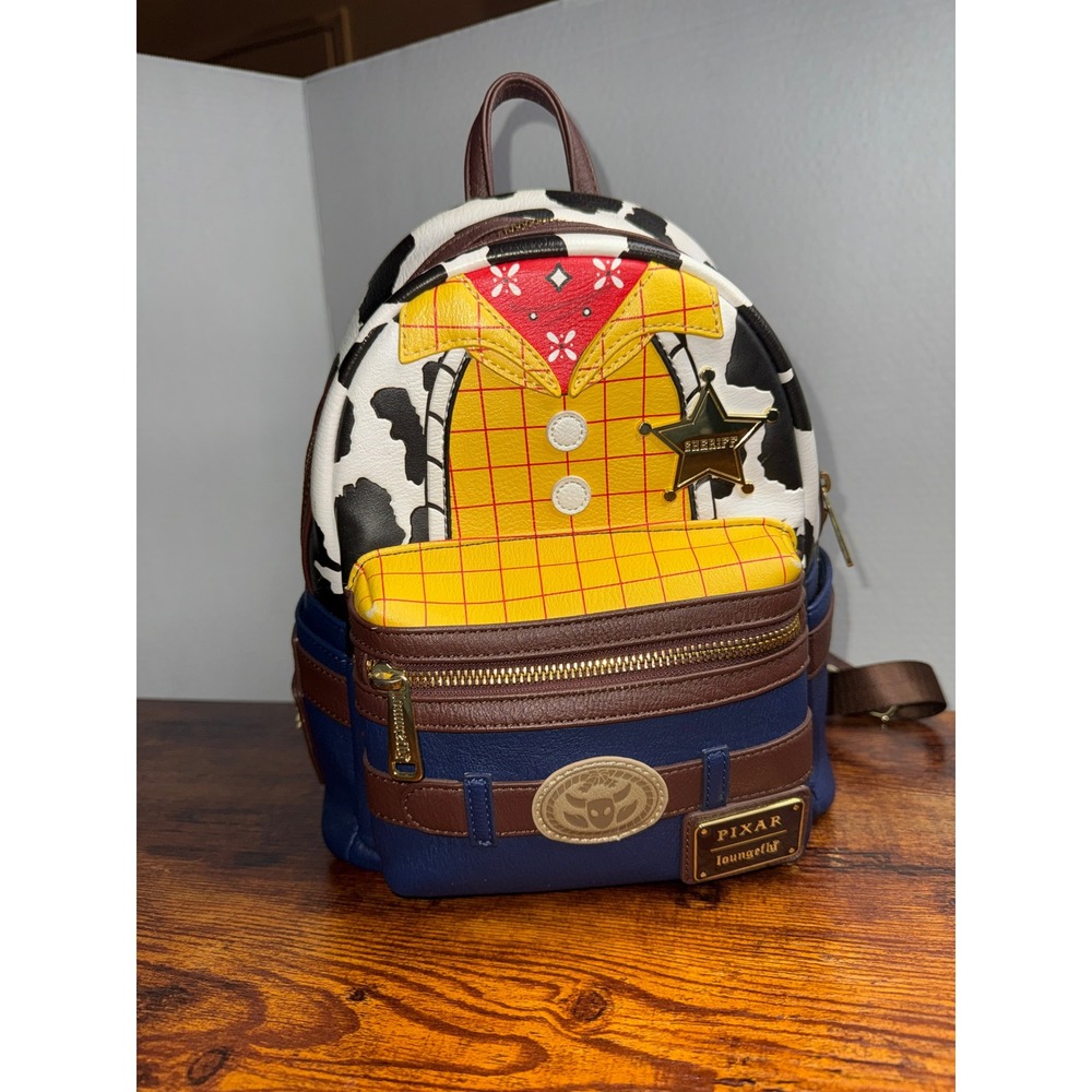 Loungefly Disney Pixar Toy Story Woody Cosplay Mini Backpack Yellow Blue Brown